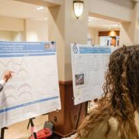 Prithwi explaining his poster